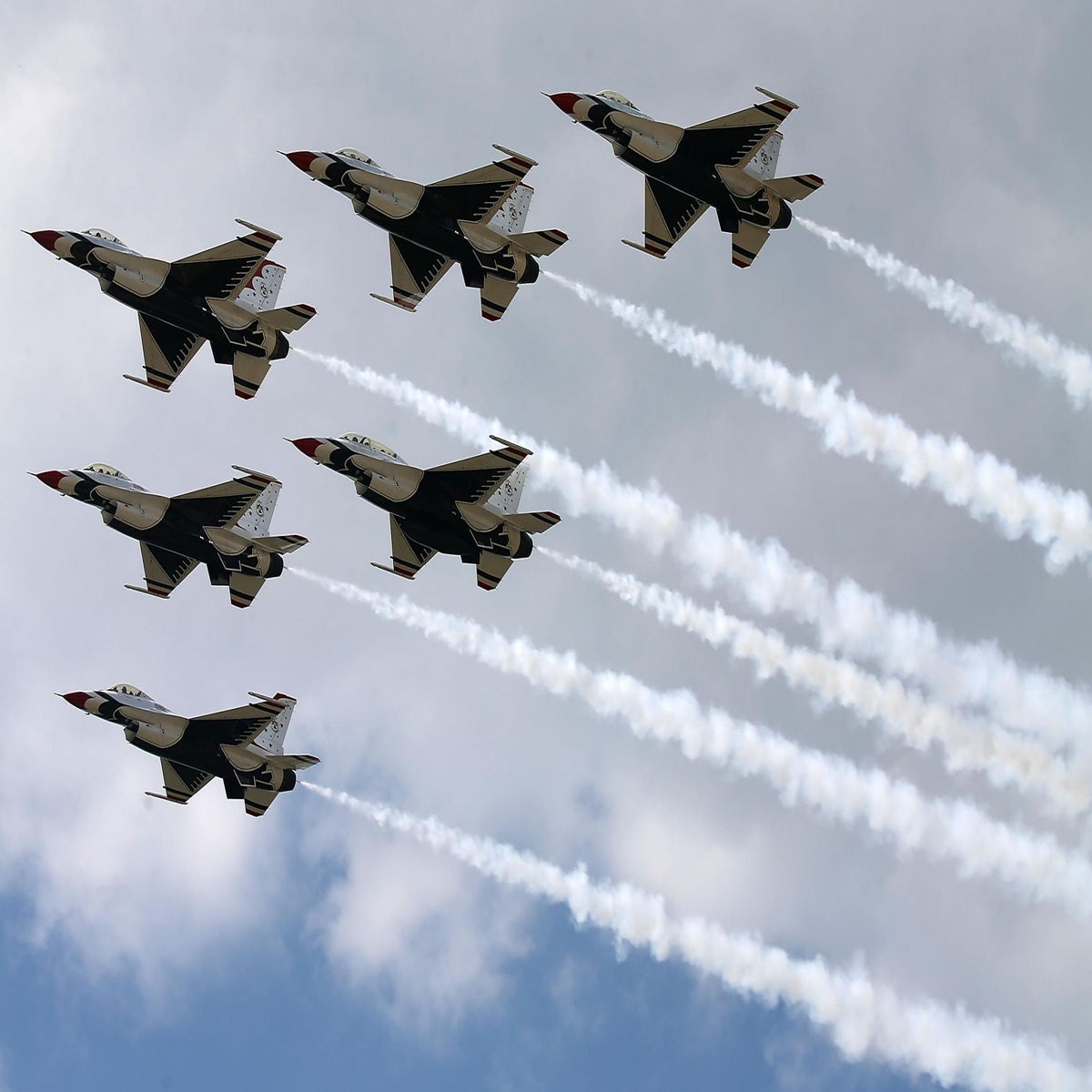 F-16 Fighting Falcons fly overhead during the New York Jets' Salute to  Service game at