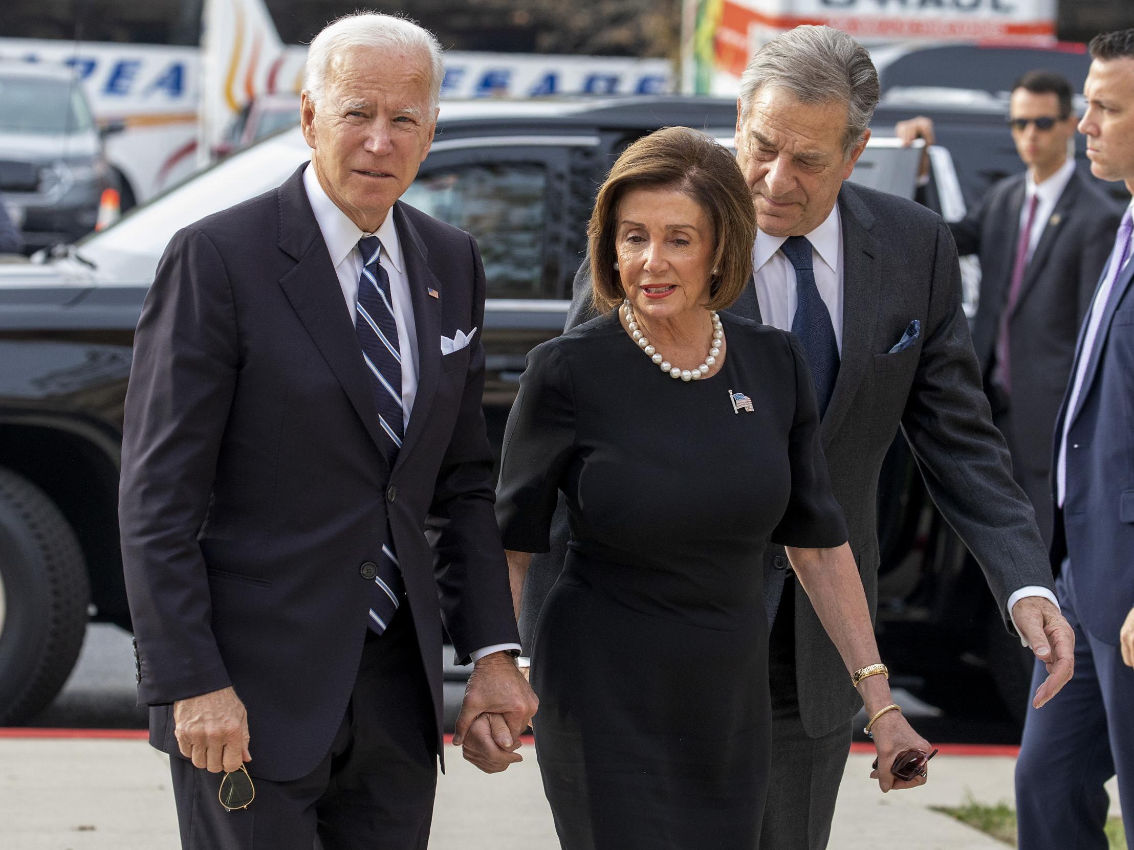 Ms Pelosi and Mr Biden in Blatimore