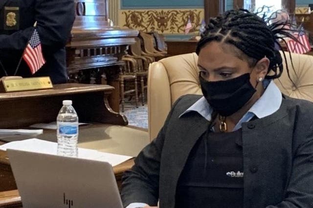 Senator Dayna Polehanki shared on Thursday some colleagues, like Senator Sylvia Santana (pictured), are wearing bulletproof vests to work as armed protesters storm the Michigan State Capitol
