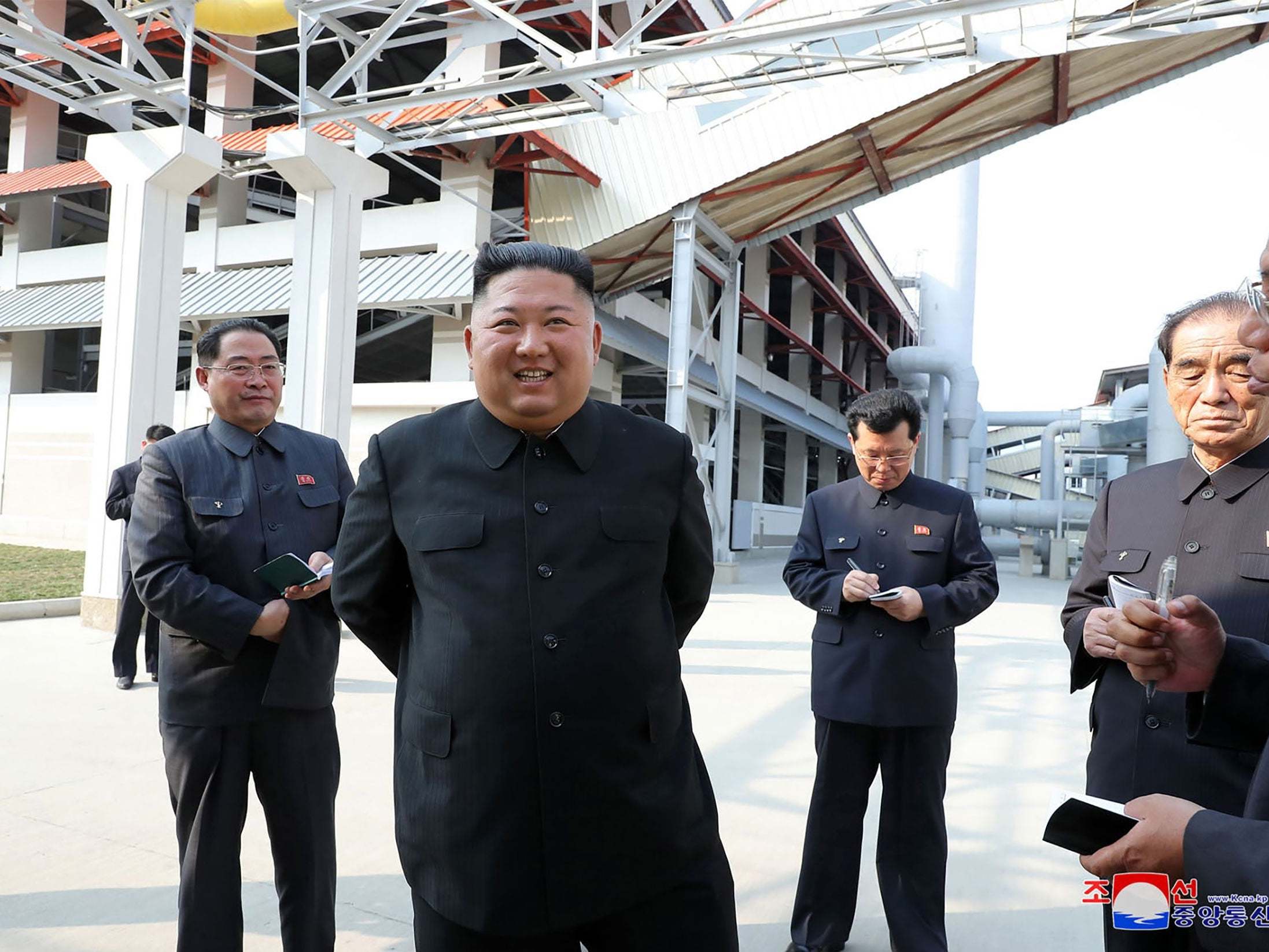 This picture, released from North Korea's official Korean Central News Agency (KCNA), shows North Korean leader Kim Jong Un visiting the completed Suchon phosphate fertilizer factory in South Pyongan Province