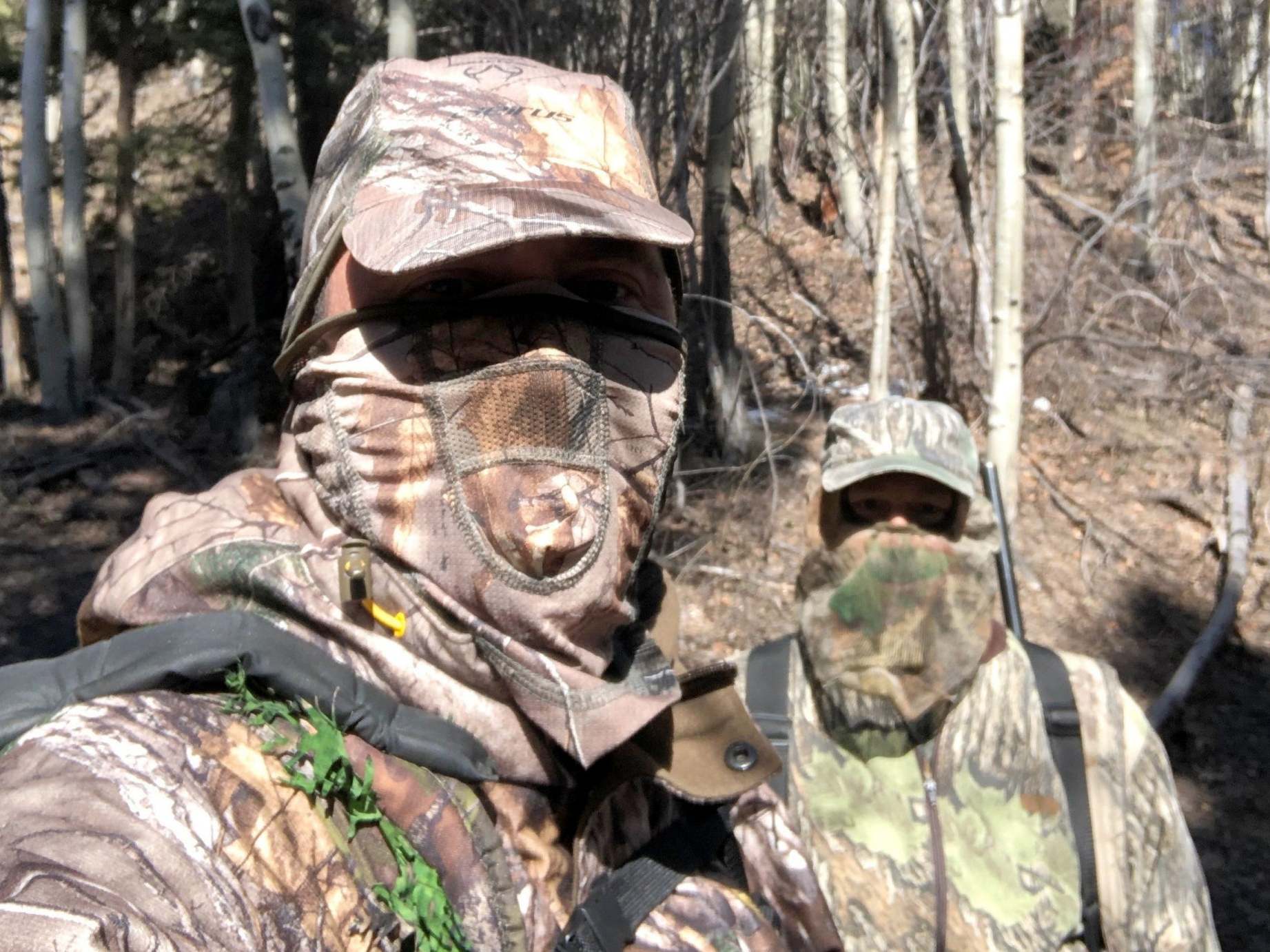Hunters Brian Van Nevel and Nathaniel Evans in a national forest near Taos, New Mexico in April where they see larger numbers of turkey hunters this season as more people go into the mountains to stalk the birds during the coronavirus pandemic