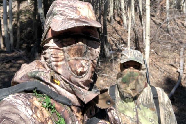 Hunters Brian Van Nevel and Nathaniel Evans in a national forest near Taos, New Mexico in April where they see larger numbers of turkey hunters this season as more people go into the mountains to stalk the birds during the coronavirus pandemic
