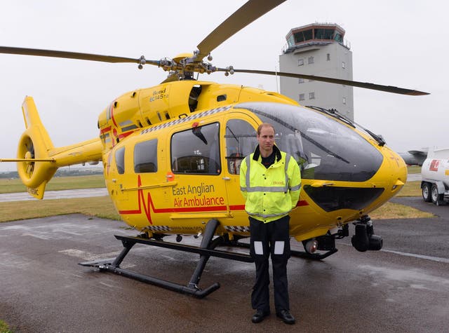 Prince William, The Duke of Cambridge as he begins his new job with the East Anglian Air Ambulance (EAAA) at Cambridge Airport on July 13, 2015 in Cambridge, England