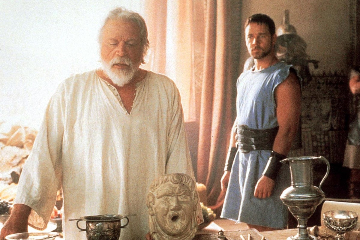 Ridley Scott says Oliver Reed ‘dropped down dead’ during a drinking match while filming Gladiator