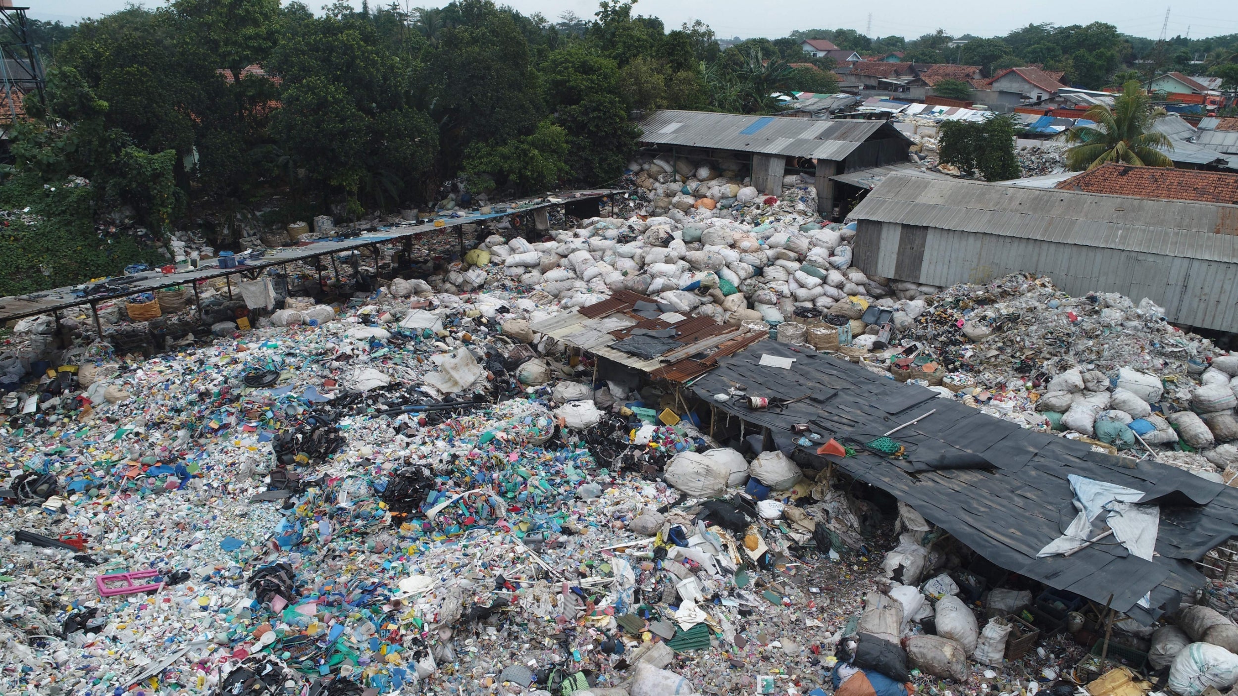 A warehouse filled with recyclable plastic collected from the Bantar Gebang landfill