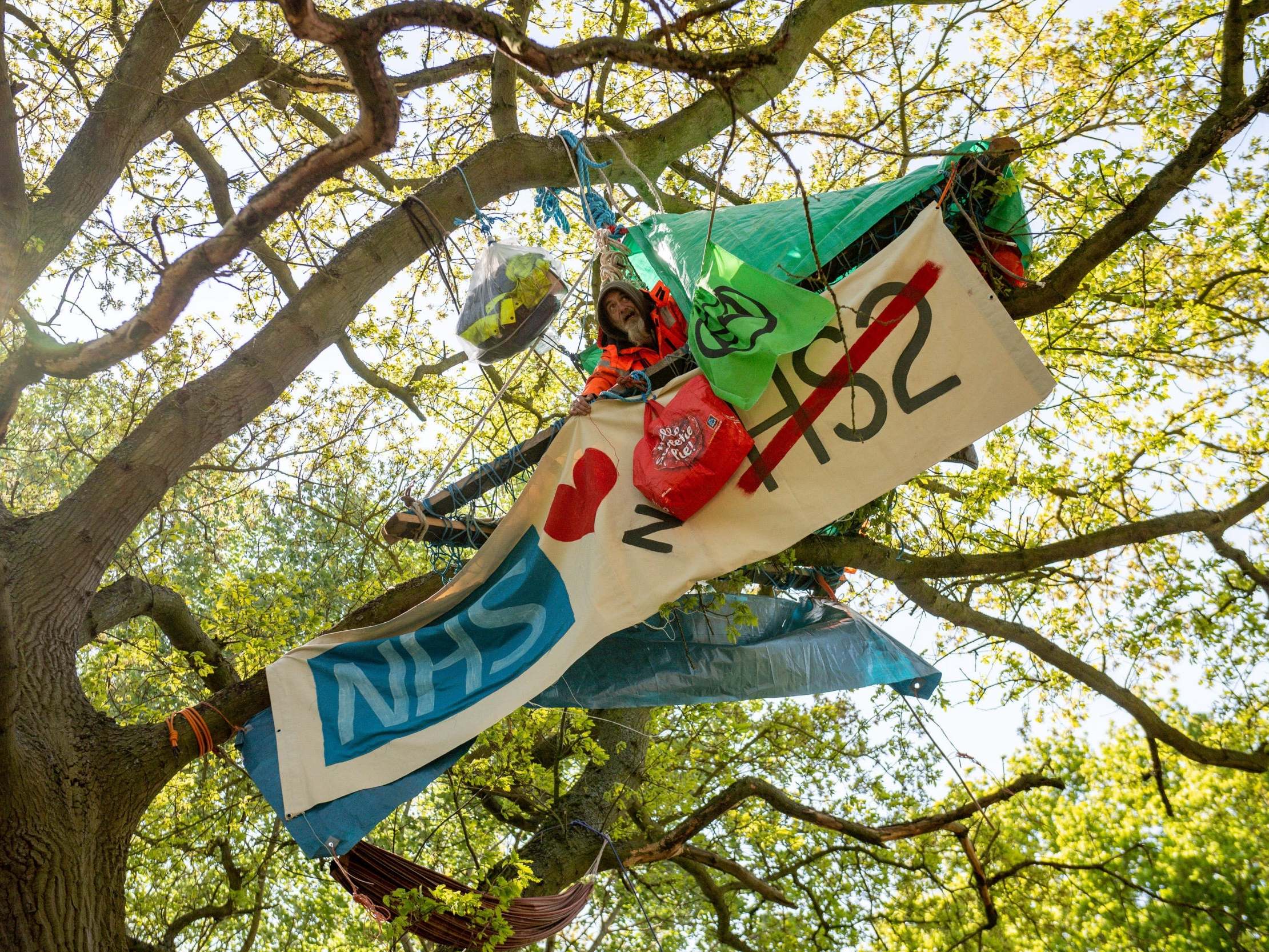 An anti-HS2 protester named Potts positioned in a tree in Crackley Woods, near Kenilworth, Warwickshire