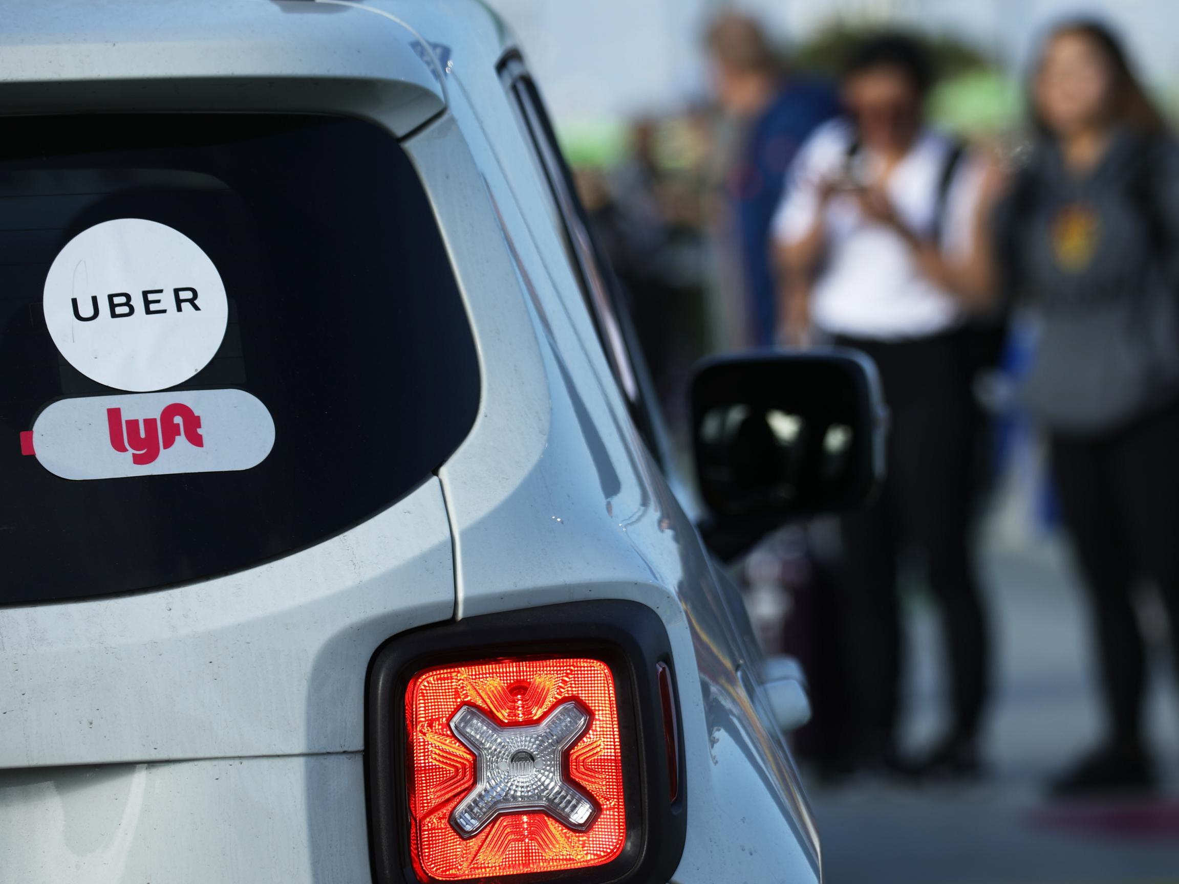 Uber and Lyft are accused of misclassifying hundreds of thousands of drivers