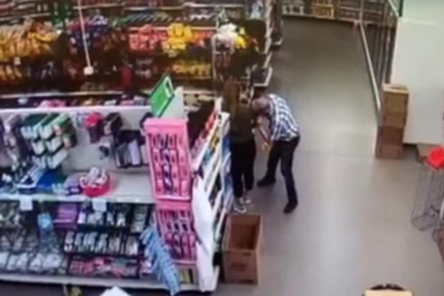 Police shared the security footage of a man seemingly wiping his face on Dollar Tree store worker