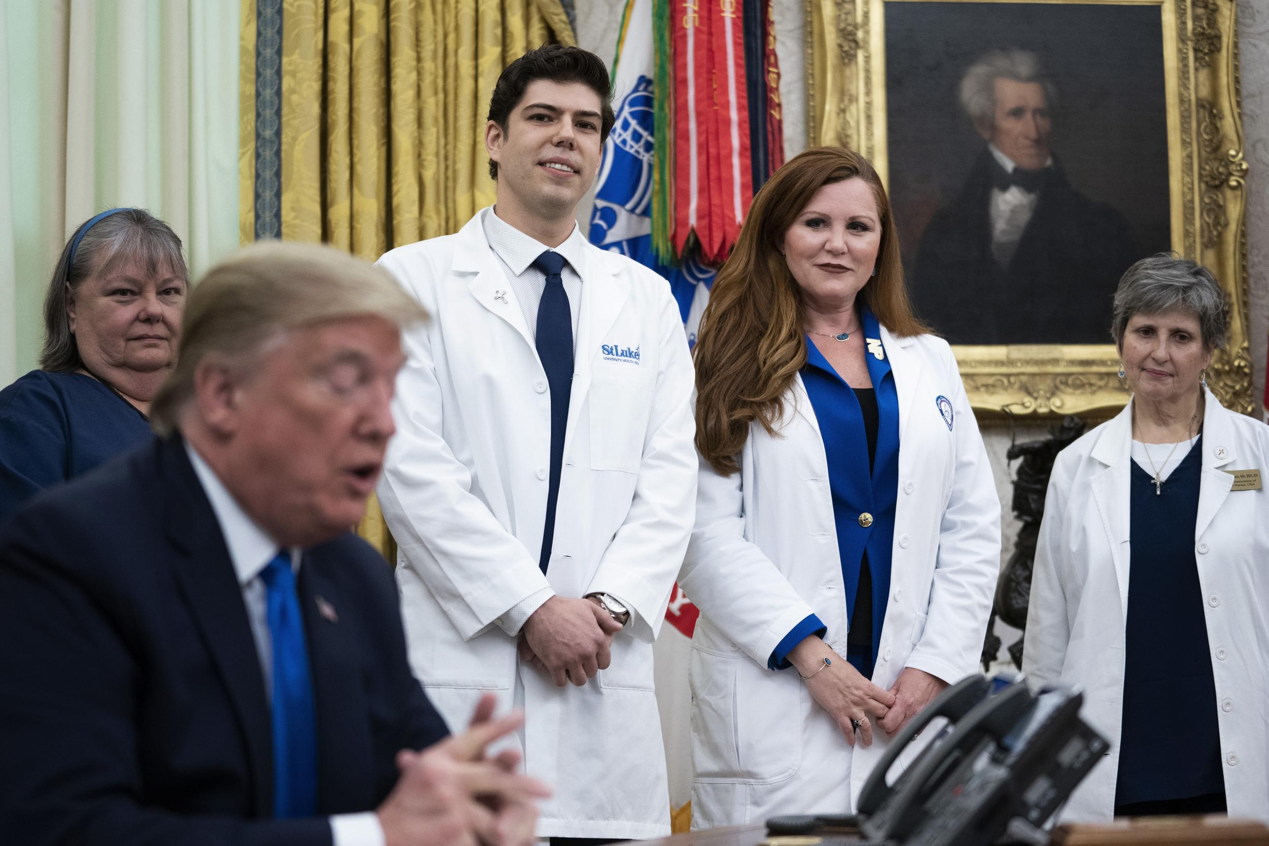 Trump contradicts nurse describing &apos;sporadic&apos; supply of protective gear despite wearing same N95 mask for &apos;a few weeks&apos;
