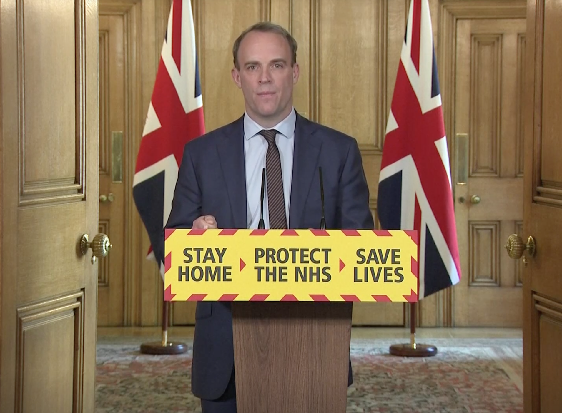 &#13;
Dominic Raab addresses journalists in Downing Street &#13;