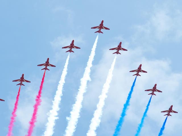 A general view of the Red Arrows fly past over Horse Guards Parade during the VE Day Parade on May 10, 2015 in London, England