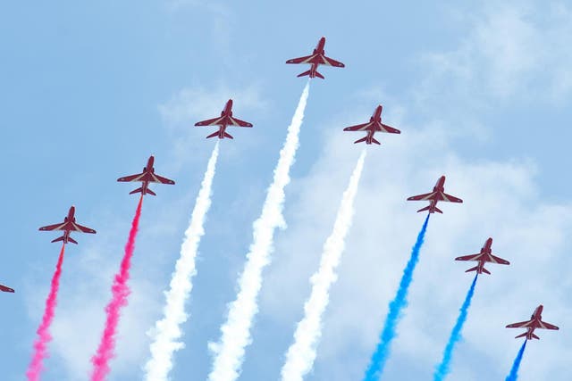 A general view of the Red Arrows fly past over Horse Guards Parade during the VE Day Parade on May 10, 2015 in London, England