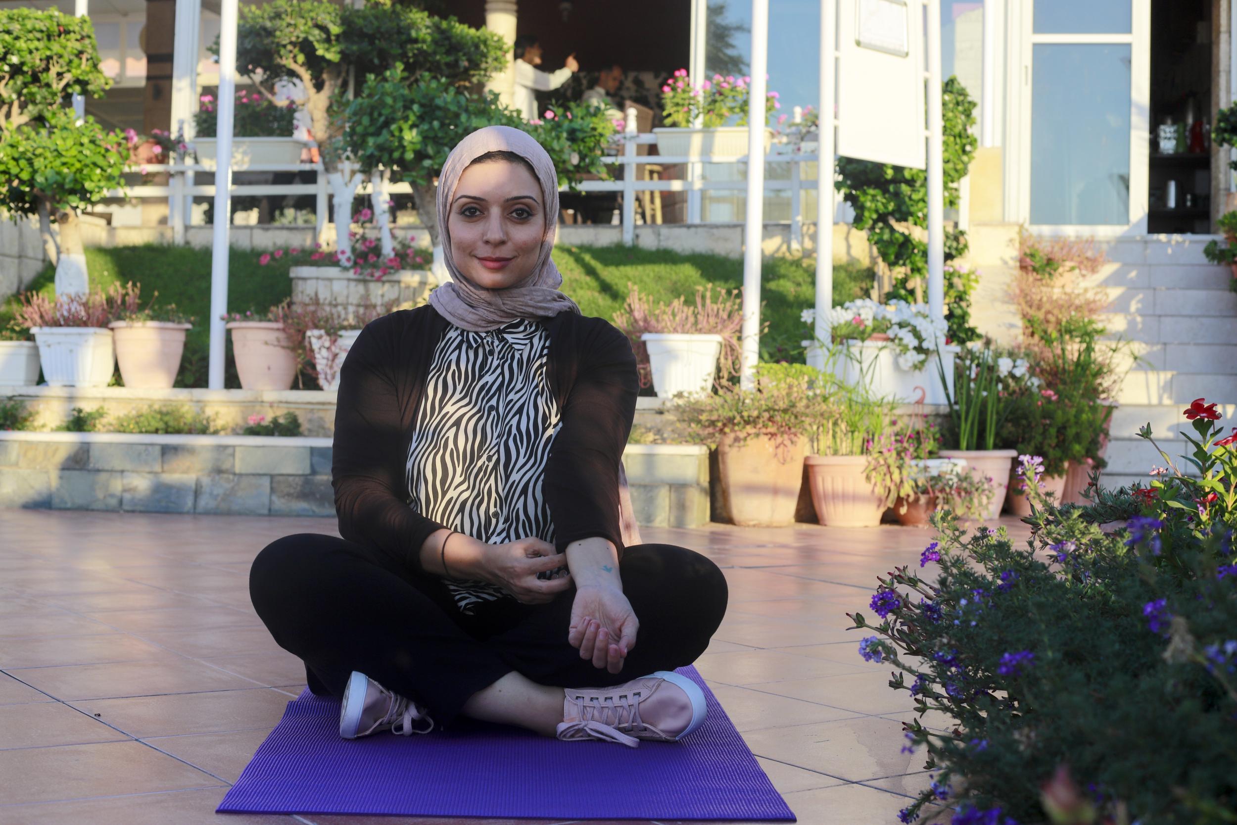 Ghada Ibrahim, 33, is a Code Academy programme officer and yogi. She has three children aged four, nine and 10