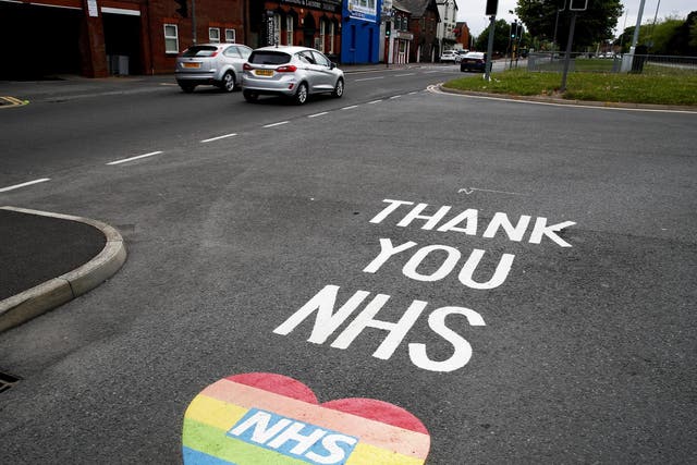A sign painted on the road reading "Thank You NHS" outside Alder Hey Hospital on May 10, 2020 in Liverpool, United Kingdom.
