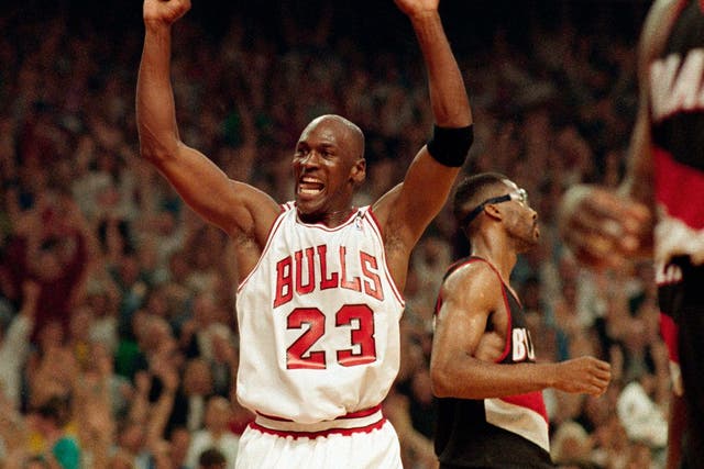 Michael Jordan celebrates the Bulls win over the Portland Trail Blazers in the NBA Finals in Chicago, 1992.