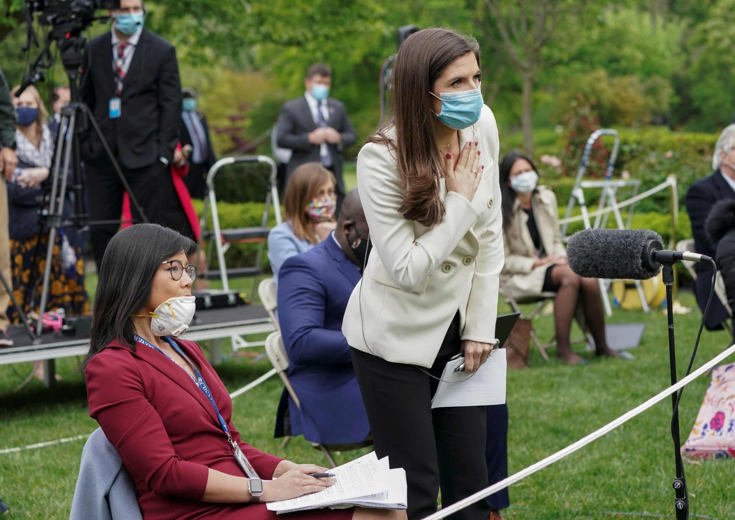 Weijia Jiang, left, of CBS and Kaitlan Collins of CNN ask questions of Donald Trump during a news conference in the Rose Garden of the White House. Following the exchange the president abruptly ended the briefing and walked away