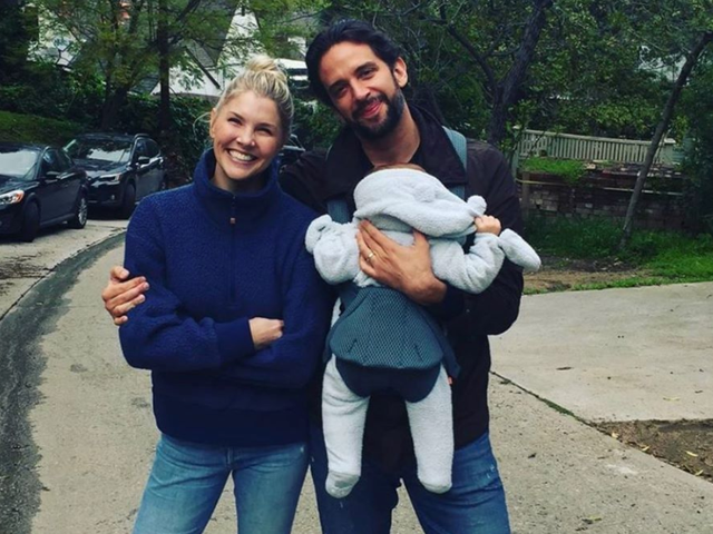 Amanda Kloots and Nick Cordero with their son, Elvis, in a family photo taken before he became ill