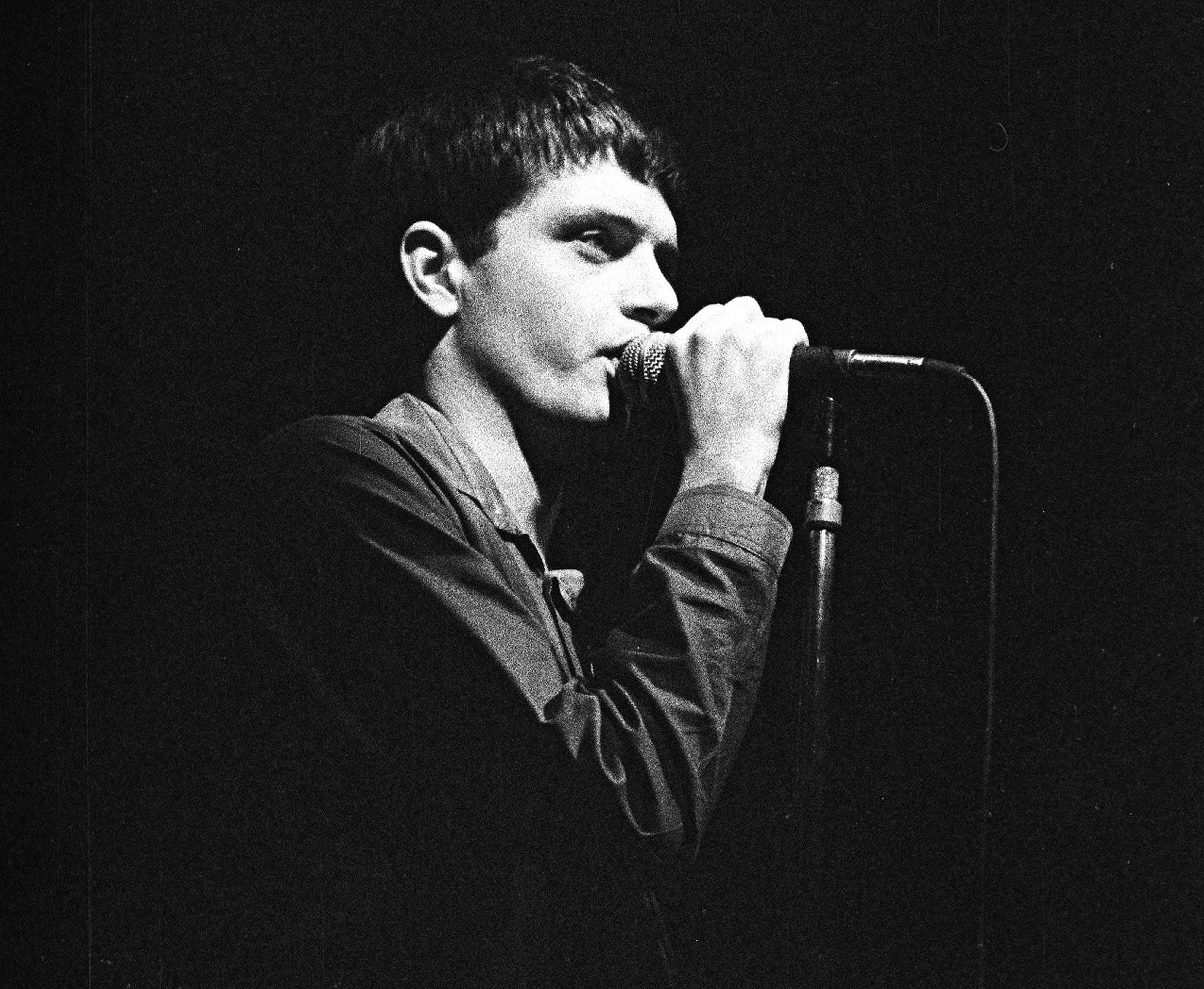 Ian Curtis at a Joy Division concert at the Electric Ballroom, London, 26 October 1979