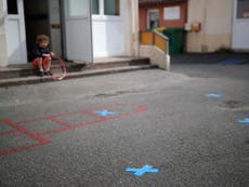 Nursery children in France forced to play in isolation chalk squares