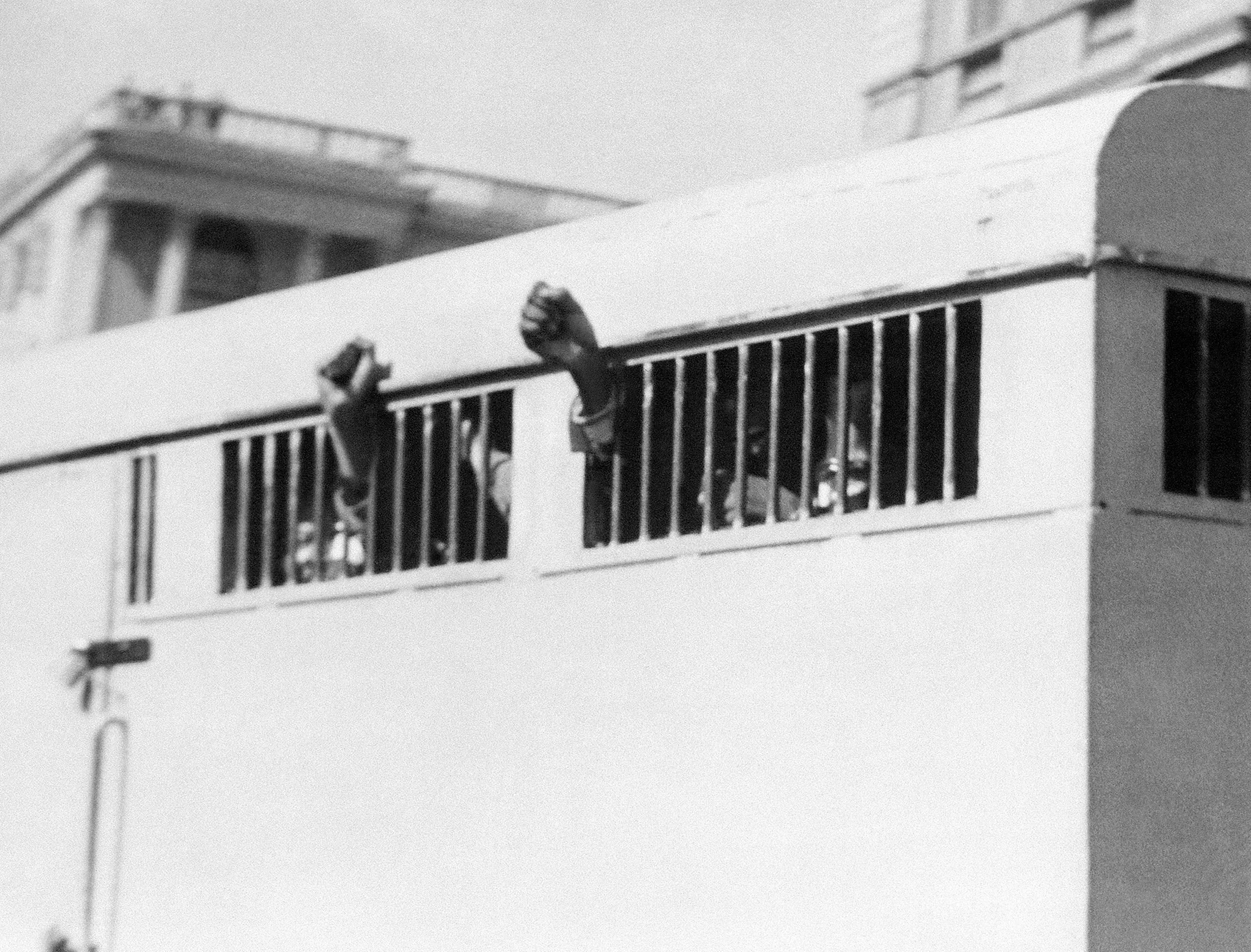 Eight men, among them Nelson Mandela, sentenced to life imprisonment in the Rivonia trial leave the Palace of Justice in Pretoria on 12 June 1964