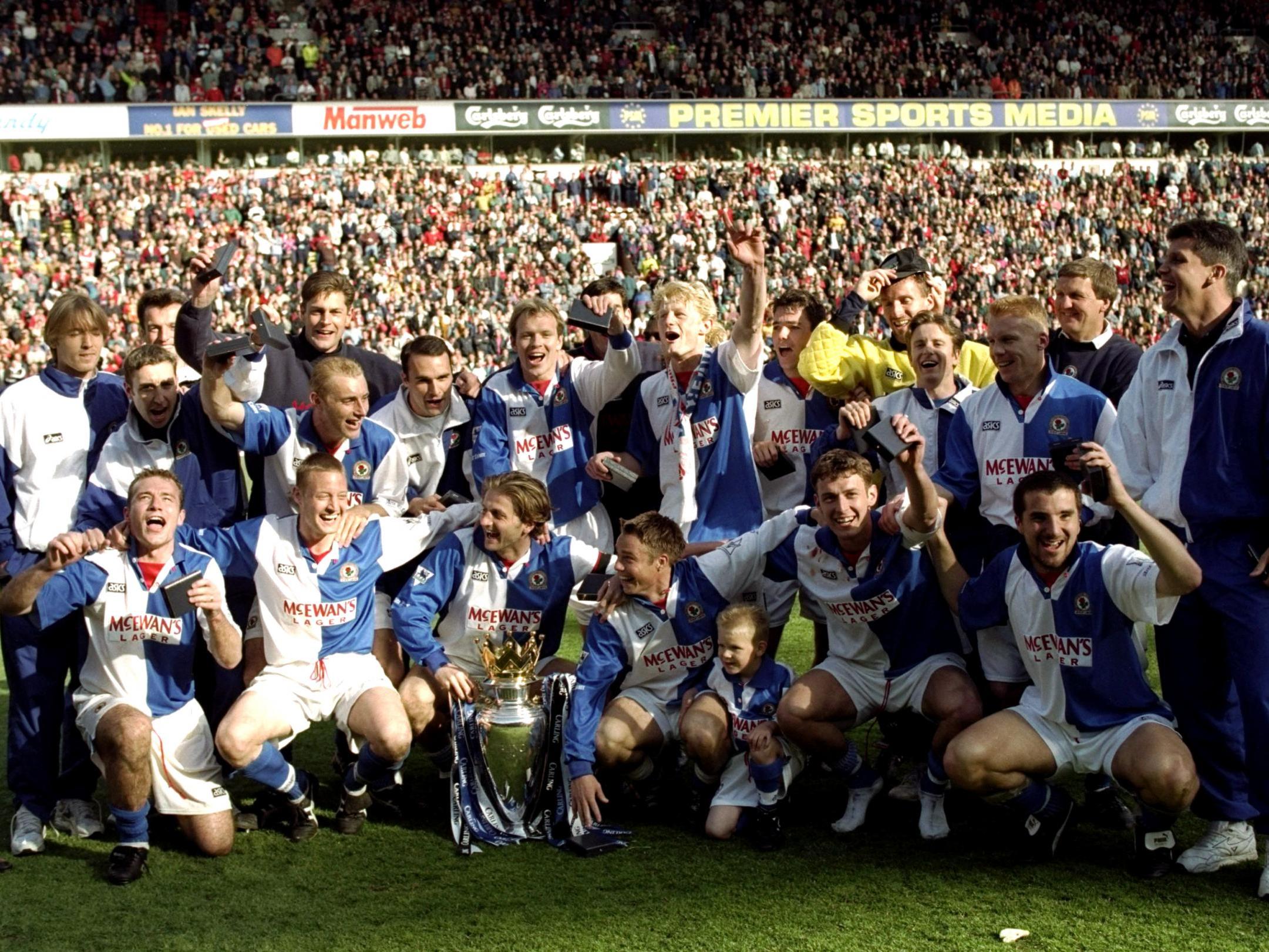 The Rovers players celebrate after the final whistle at Anfield