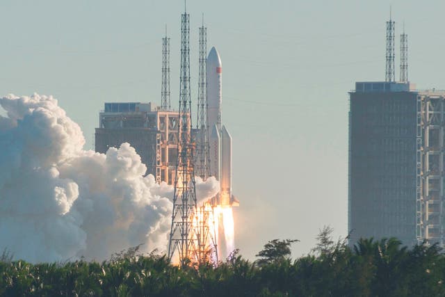 TOPSHOT - A Long March 5B rocket lifts off from the Wenchang launch site on China's southern Hainan island on May 5, 2020. - Chinese state media reported the "successful" launch of a new rocket on May 5, a major test of its ambitions to operate a permanent space station and send astronauts to the Moon.