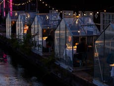 Amsterdam restaurant creates greenhouses for diners to enjoy meals