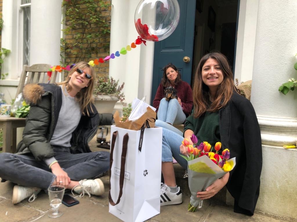 Sara (pictured on the right) celebrating with her housemates and many special deliveries