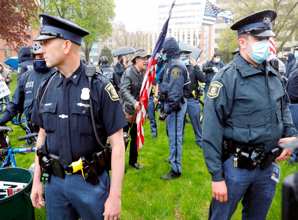 Naked Doll Hanging By A Noose Prompts Fight At Armed Anti Lockdown Protest In Michigan The Independent The Independent
