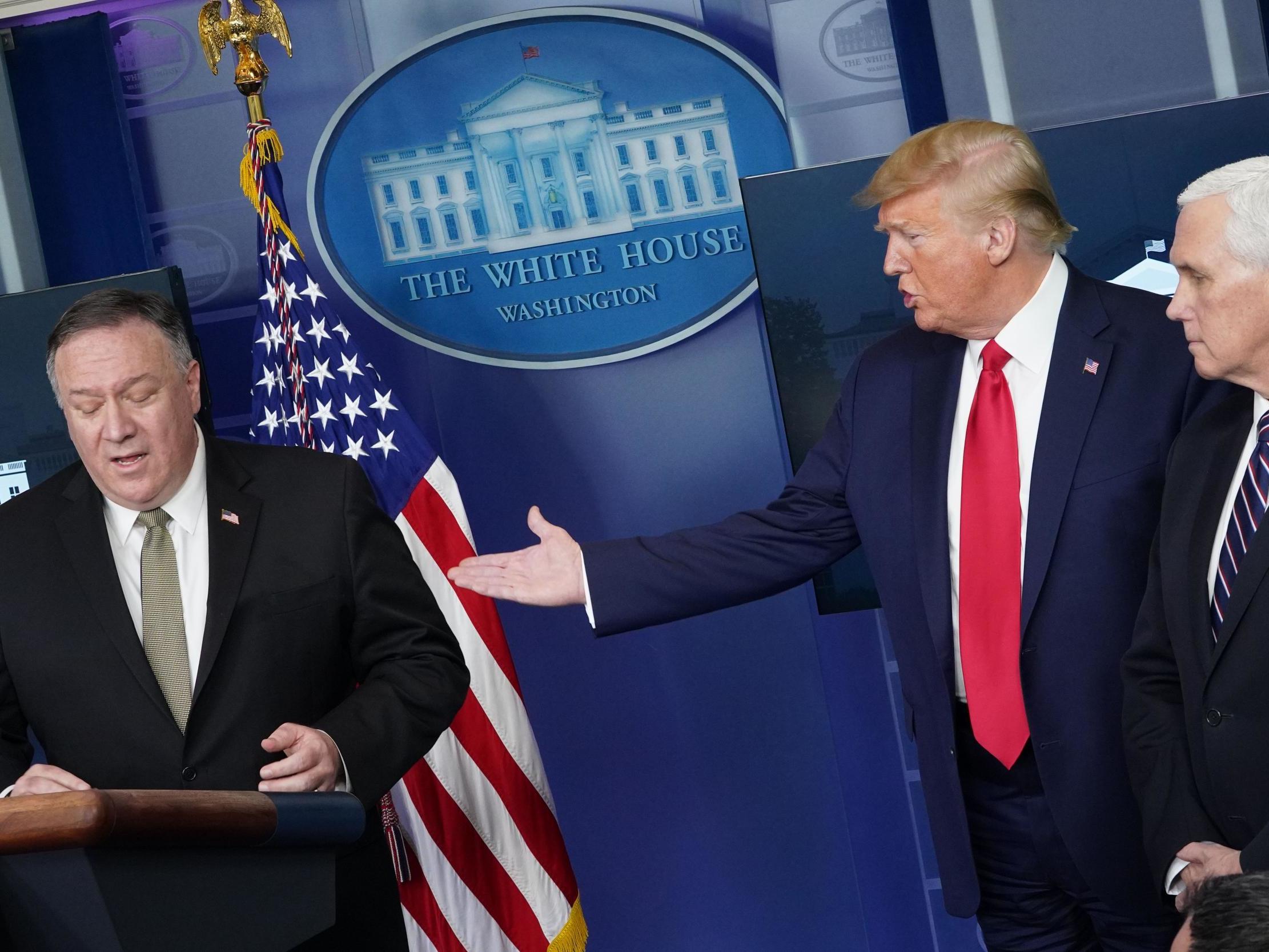 Mike Pompeo, secrtary of state, Donald Trump, the president, and MIke Pence, vice president (left to right) during a daily coronavirus briefing in the Brady Briefing Room in the White House on 8 April 2020 in Washington DC