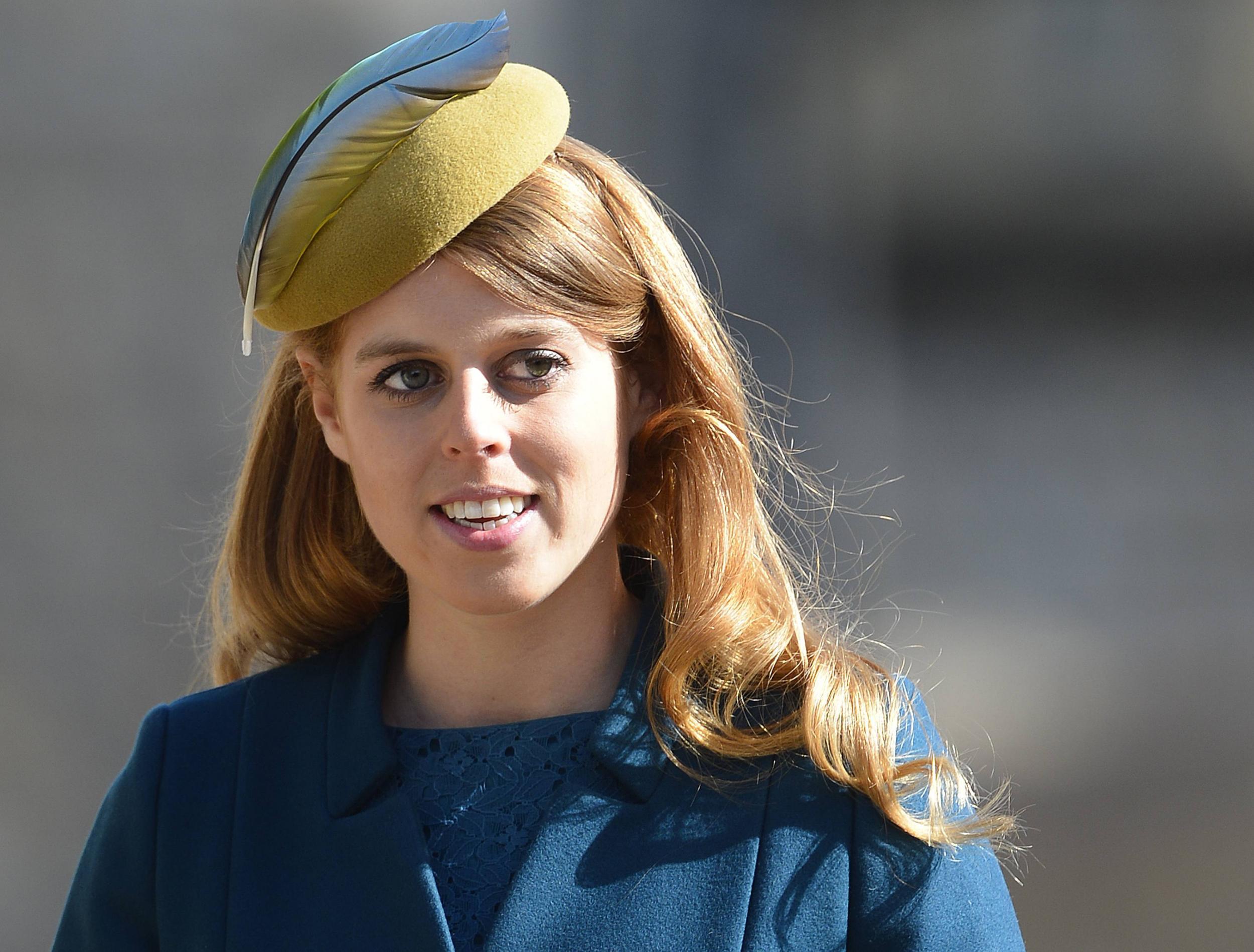 Princess Beatrice wears a hat during an Easter service