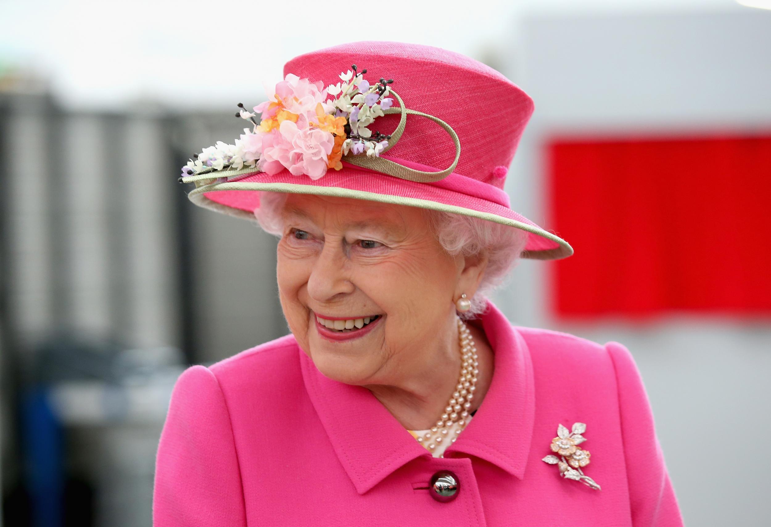 The Queen wears bright colours so she is easily visible