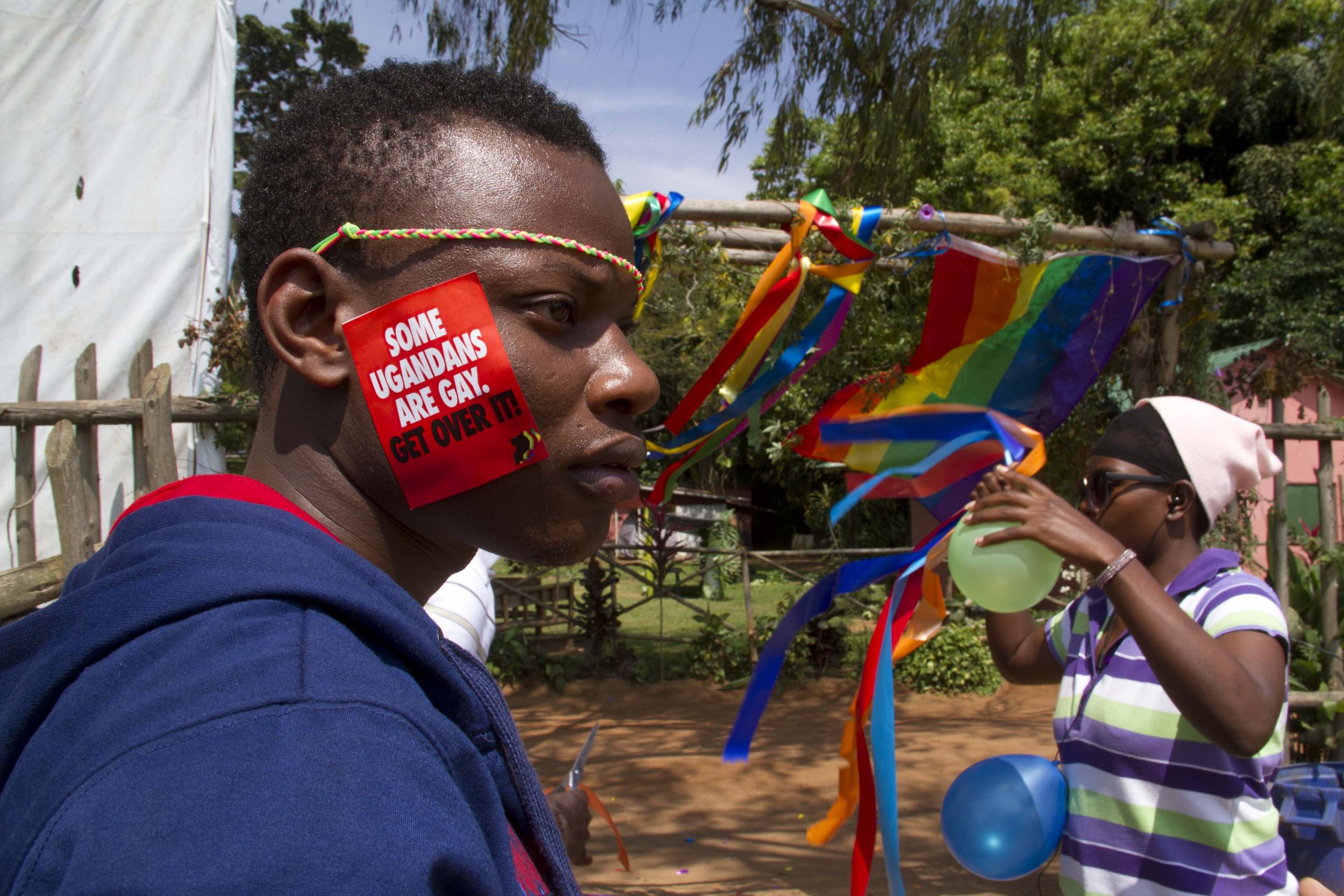 A man takes part in a gay pride event in Entebbe, Uganda