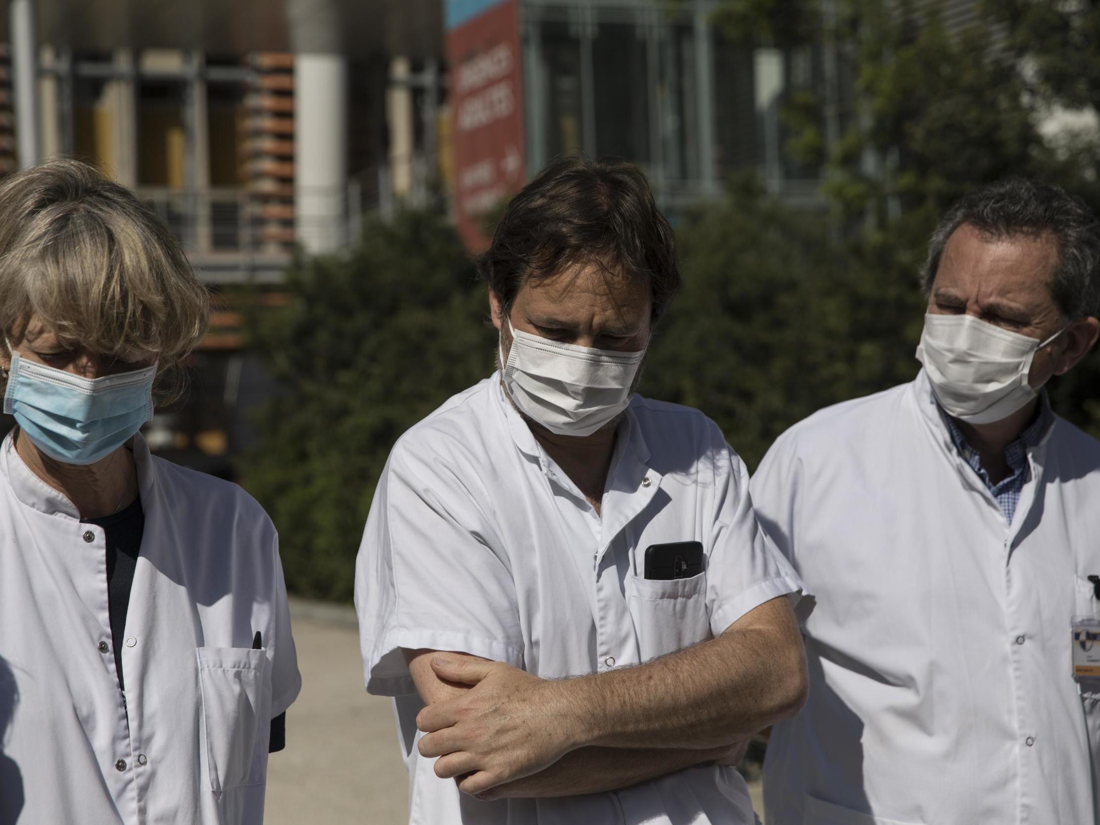 Professor Caroline Ovaert (L), Doctor Fabrice Michel and Professor Hervé Chambost (R) hold a press conference at La Timone Hospital in Marseille after the death of a 9-year-old boy