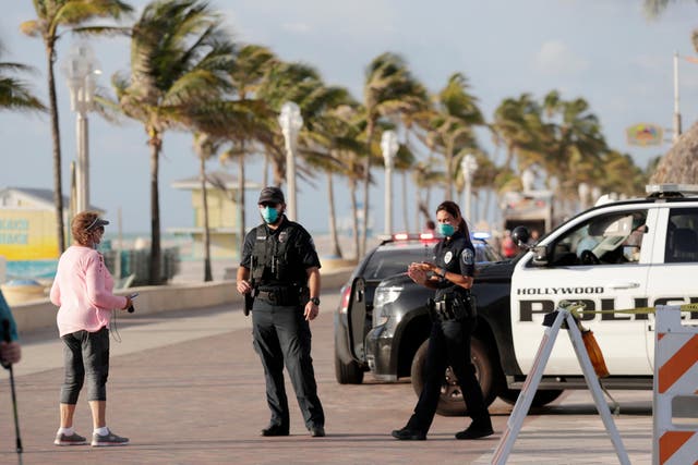 Police on Hollywood Beach Broadwalk in Florida on patrol during the coronavirus pandemic