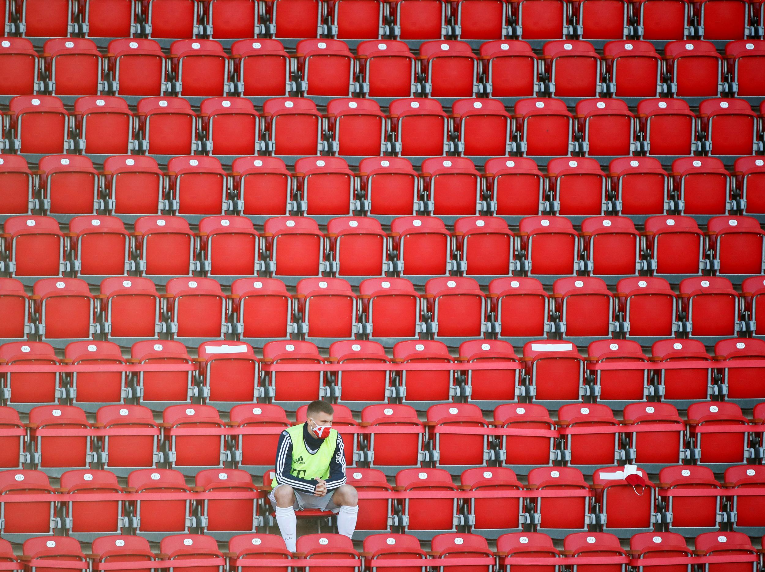 Bayern Munich substitute Lukas Mai watches on