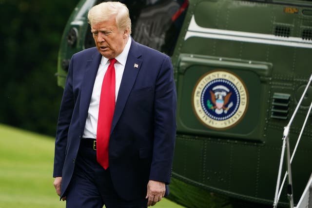 Donald Trump arrives at the White House on Marine One after a weekend at Camp David