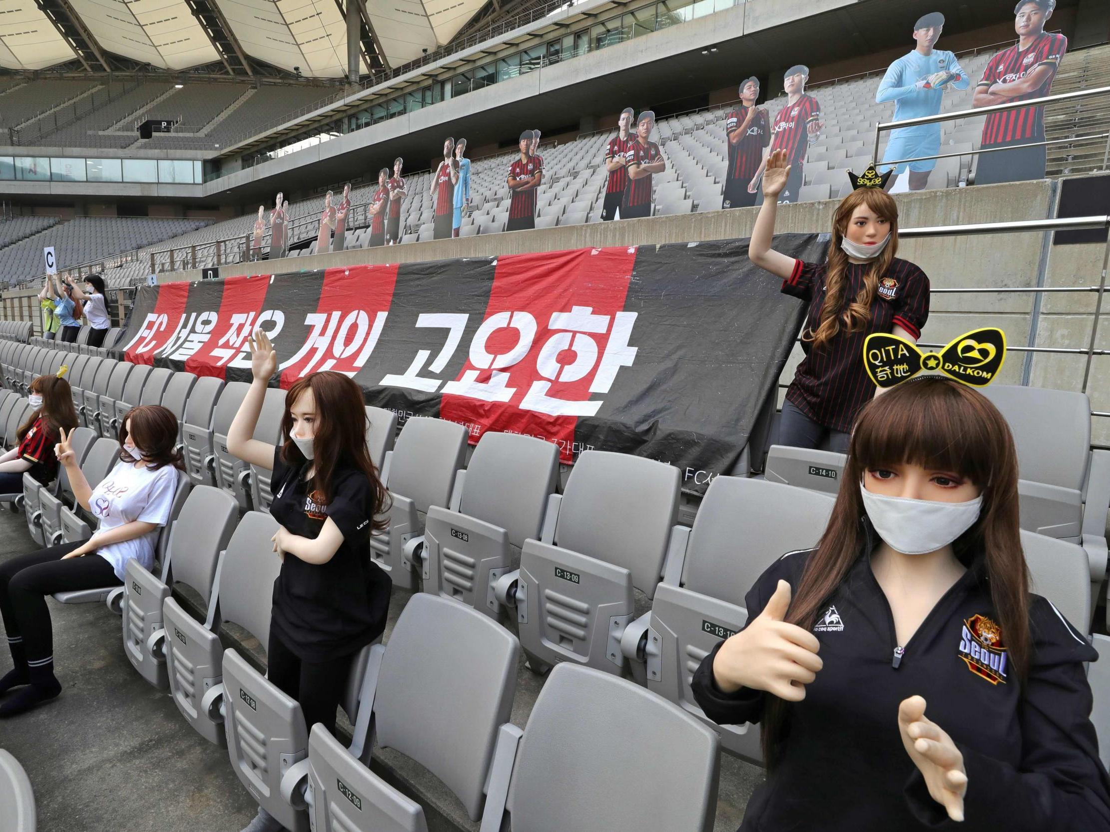 Mannequins are displayed at a FC Seoul football match