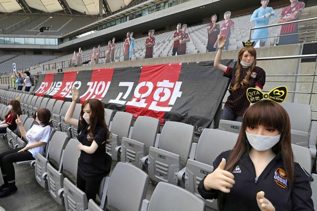 Mannequins are displayed at a FC Seoul football match