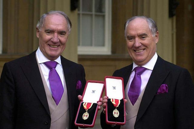 <p>Sir David Barclay (left) and twin brother Sir Frederick after receiving knighthoods in 2000</p>