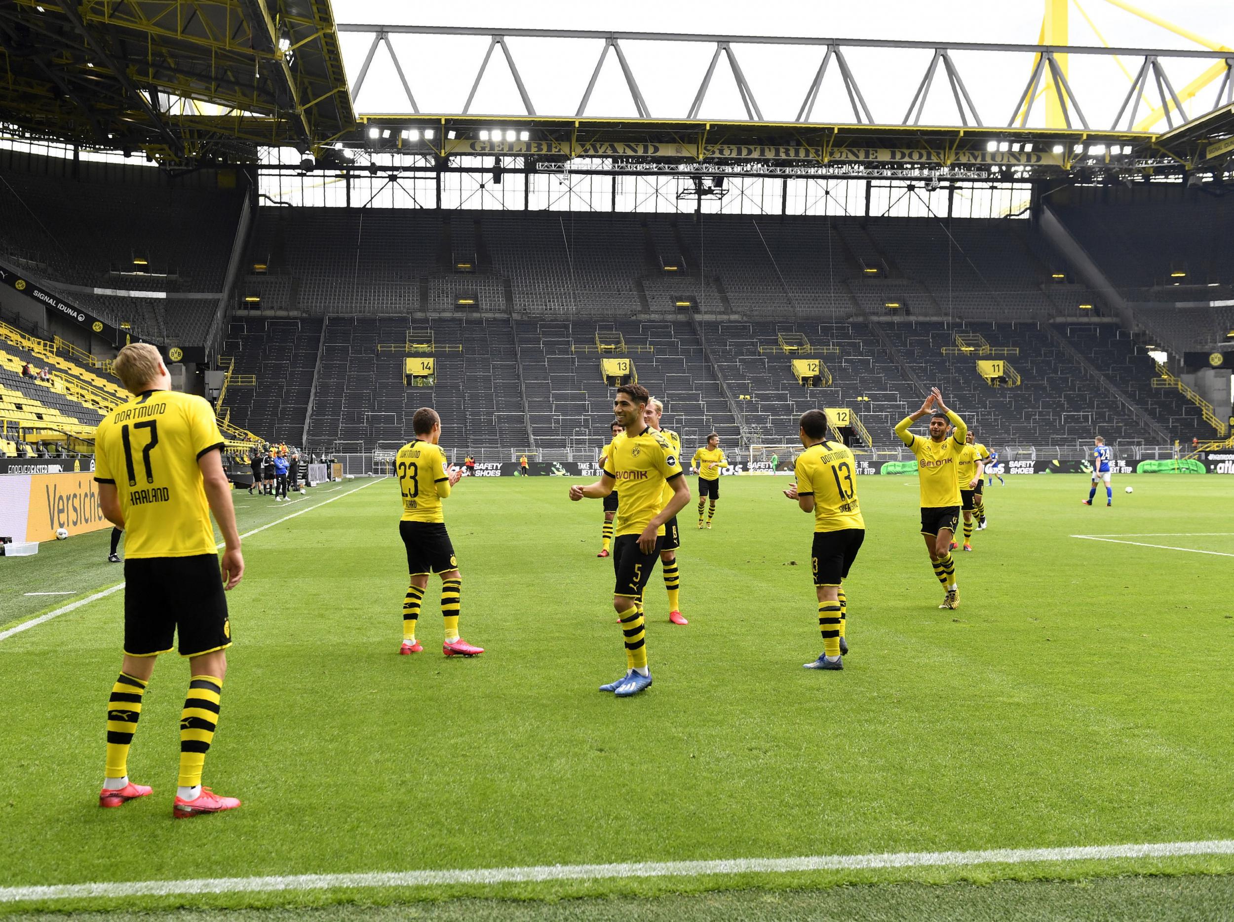 Haaland leads Dortmund's socially distant celebration