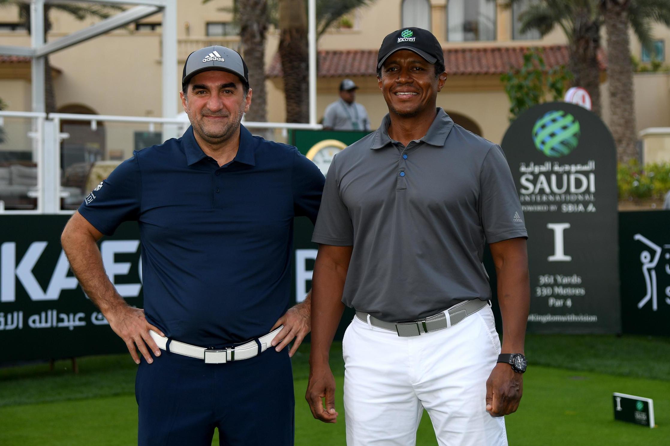 Al-Rumayyan, here with Majed Al Sorour, CEO of the Saudi Golf Federation, is an enthusiastic golfer, playing off a handicap of 12