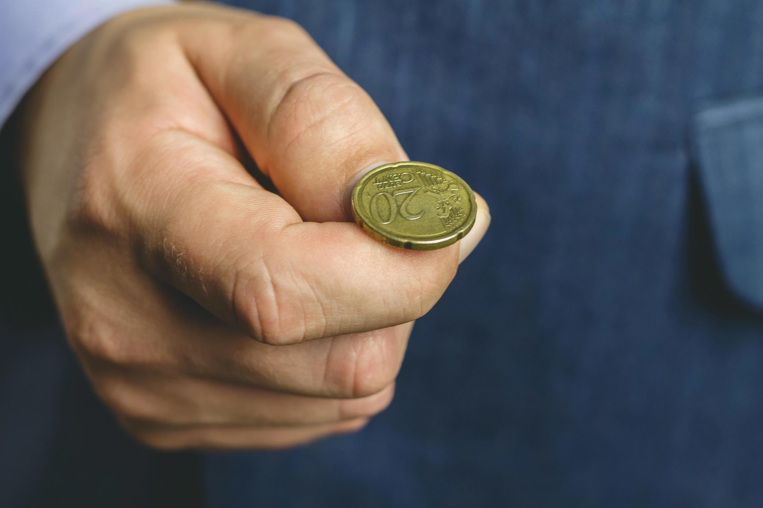 Using a coin toss to make decisions makes people happier (Stock)