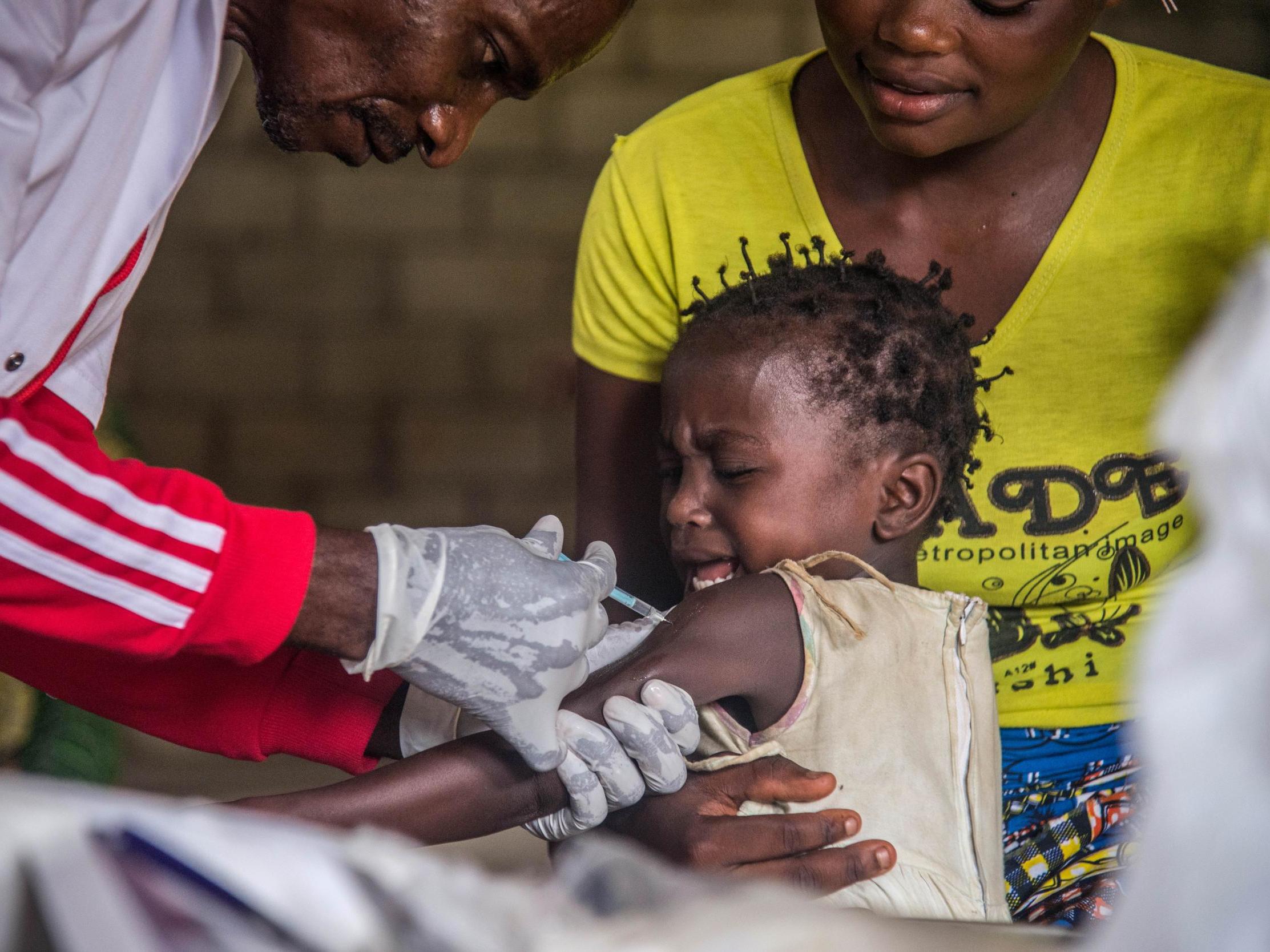 A toddler undergoes a measles vaccination at a centre in Temba, western DRC last March.