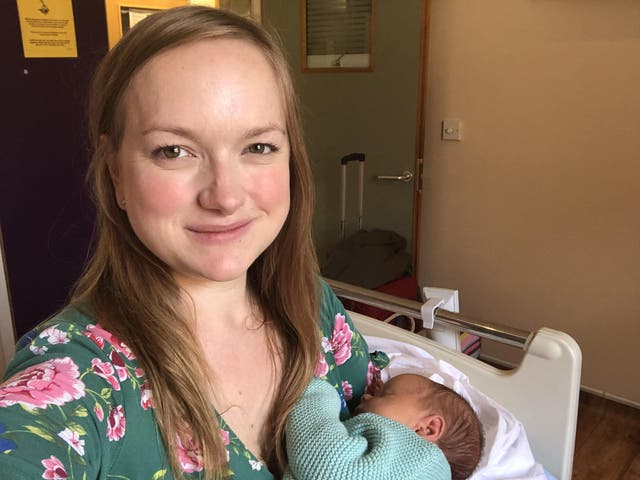 Heather Davies and her newborn son, preparing to leave hospital after a 10-day stay with no visitors