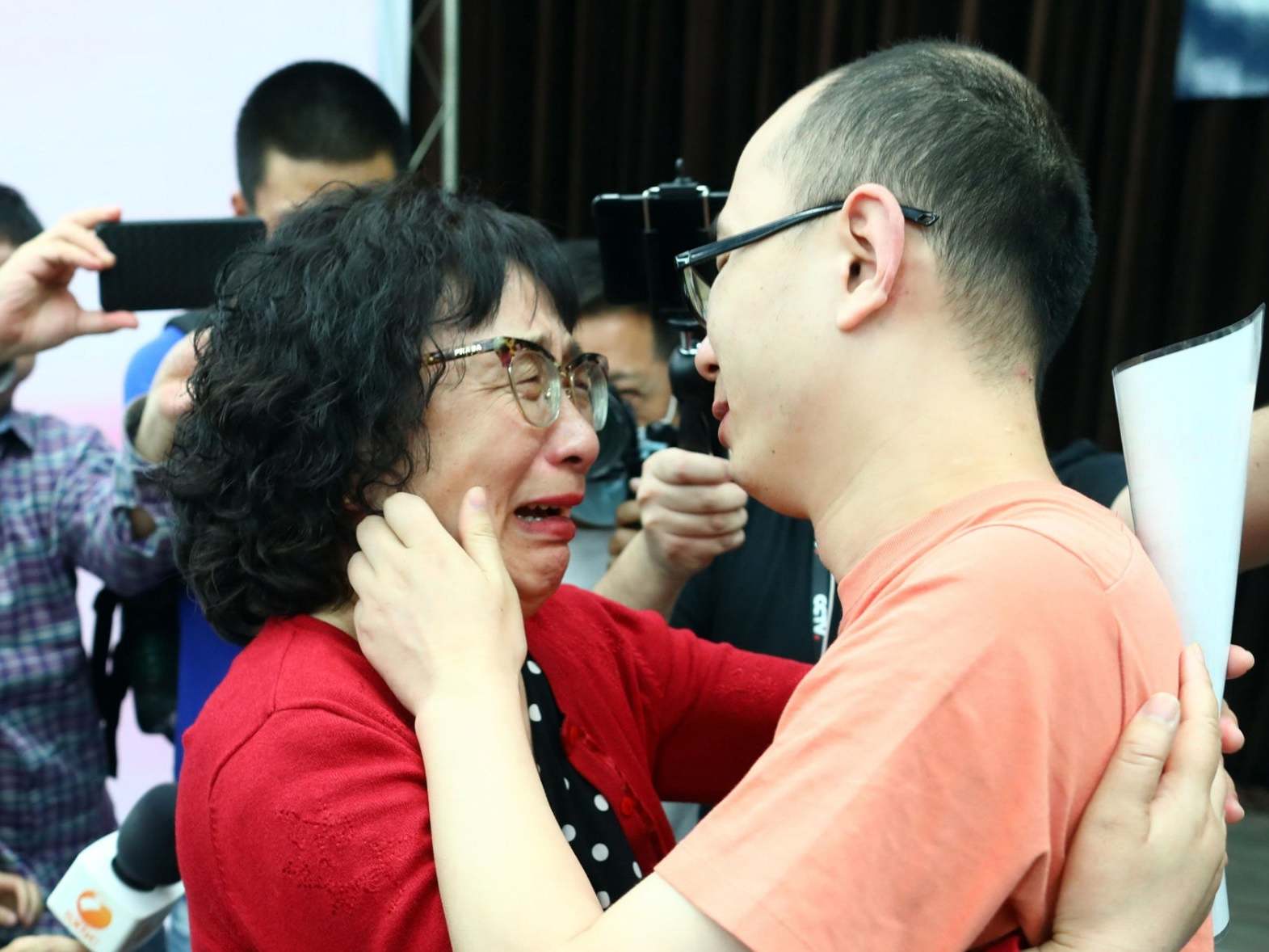 Parents reunited with son abducted in 1988 and sold to adoptive family for $840