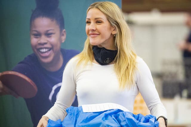 Singer-songwriter Ellie Goulding joins Evgeny Lebedev, a shareholder of The Independent, along with volunteers from Greenhouse to help feed vulnerable people across London