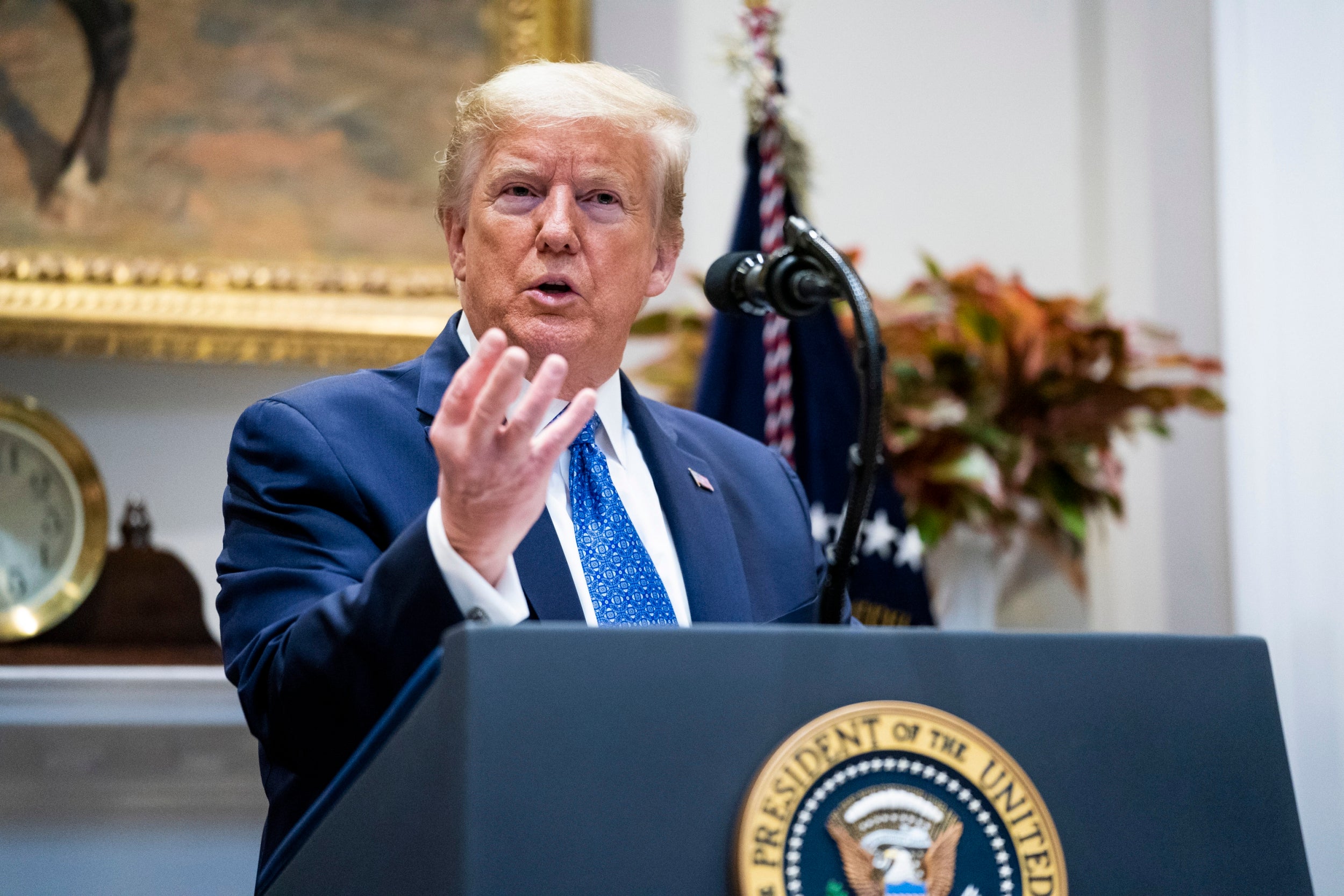 Trump announces executive order &apos;suspending&apos; regulations impeding the economy