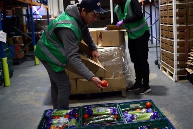 Volunteers sort food at the FareShare redistribution centre in Deptford