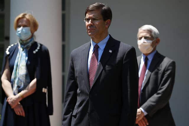 Defense Secretary Mark Esper pictured with White House coronavirus response coordinator Dr. Deborah Birx and Director of the National Institute of Allergy and Infectious Diseases Dr. Anthony Fauci